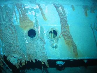 Scuttles visible on inverted port bow section